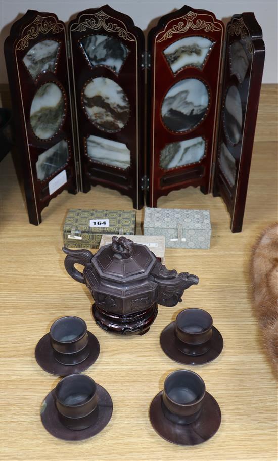 A Chinese stone tea set, a dream stone table screen and various soapstone seals